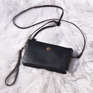 Black leather crossbody purse with iWalk charger